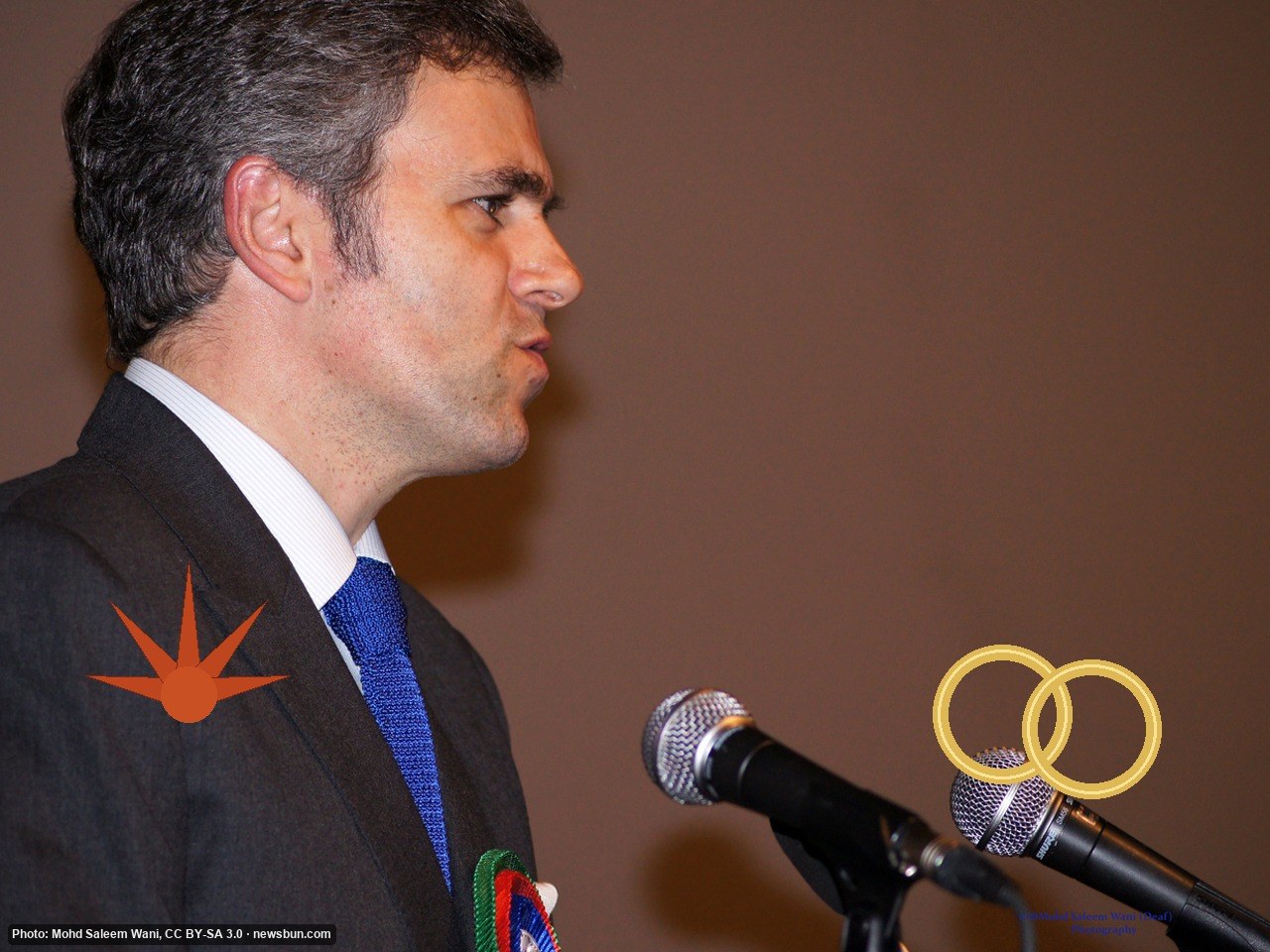 Real photo, trimmed and resized only: Omar Abdullah speaking (file photo, 2012). Drawn props, captions and sound by newsbun.